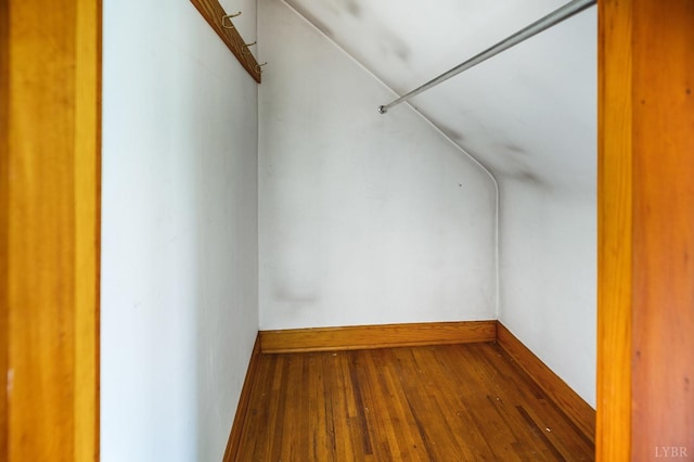 501 W Spencer Rd, Hurt, VA 24563 - additional living space with vaulted ceiling, wood finished floors, and baseboards