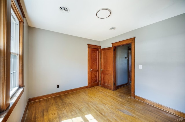 501 W Spencer Rd, Hurt, VA 24563 - unfurnished room with baseboards and light wood-style floors