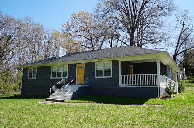 203 Marshall St, Brookneal, VA 24528 - view of front of home with a chimney, a front yard, and crawl space