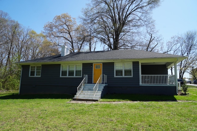 203 Marshall St, Brookneal, VA 24528 - view of front facade with crawl space, a front lawn, and a chimney
