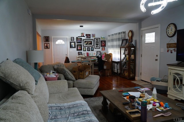 203 Marshall St, Brookneal, VA 24528 - living room with wood finished floors and a chandelier