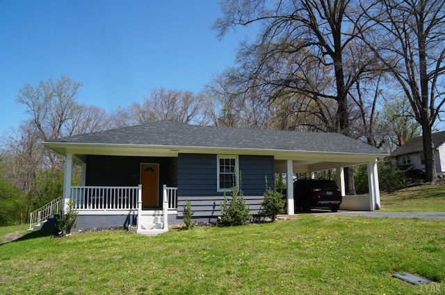 203 Marshall St, Brookneal, VA 24528 - view of front of property with covered porch, a front lawn, an attached carport, and asphalt driveway