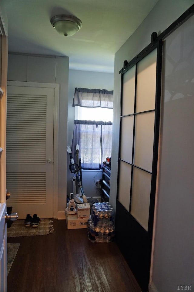 203 Marshall St, Brookneal, VA 24528 - misc room with wood finished floors and a barn door