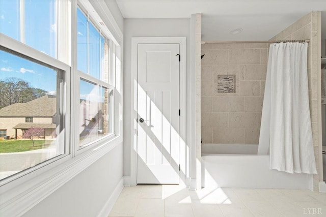 1031 Tori Ct, Forest, VA 24551 - bathroom with shower / tub combo with curtain, tile patterned flooring, and baseboards