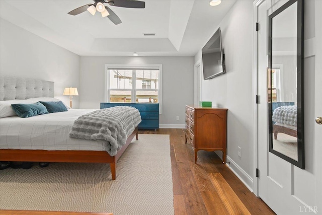 1031 Tori Ct, Forest, VA 24551 - bedroom with a raised ceiling, wood finished floors, baseboards, and a ceiling fan