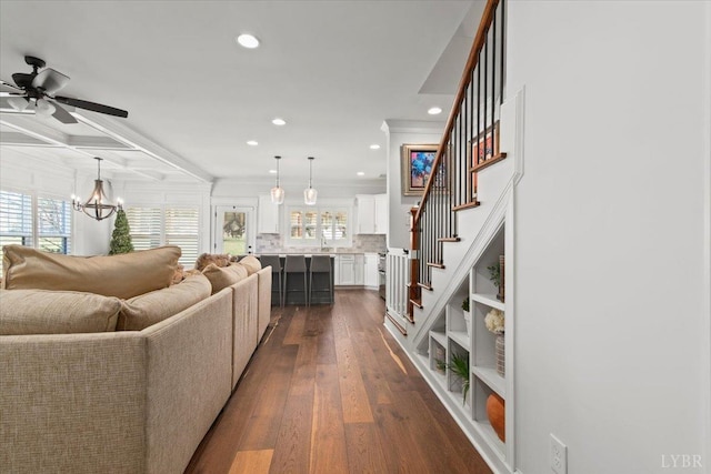1031 Tori Ct, Forest, VA 24551 - living room featuring stairs, ceiling fan, a chandelier, recessed lighting, and dark wood finished floors