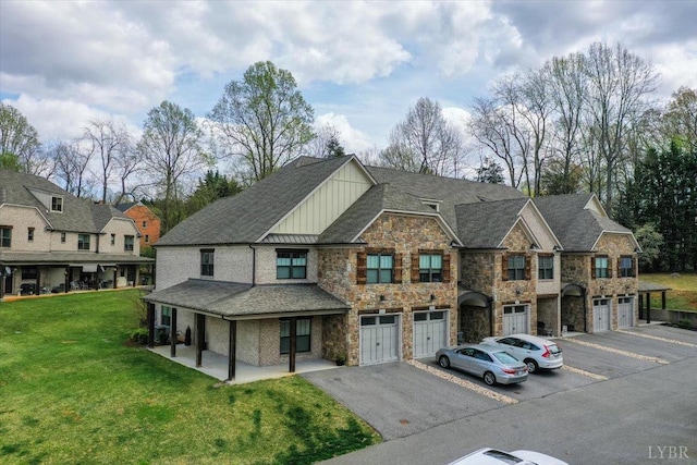 1031 Tori Ct, Forest, VA 24551 - townhome / multi-family property featuring board and batten siding, stone siding, an attached garage, and driveway