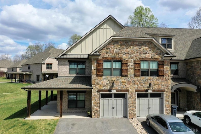 1031 Tori Ct, Forest, VA 24551 - view of front of home with board and batten siding, driveway, stone siding, and a front yard