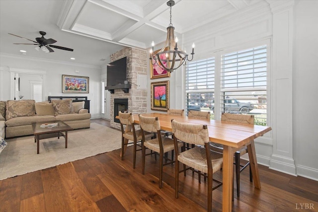 1031 Tori Ct, Forest, VA 24551 - dining area with ornamental molding, healthy amount of natural light, coffered ceiling, a chandelier, and a stone fireplace