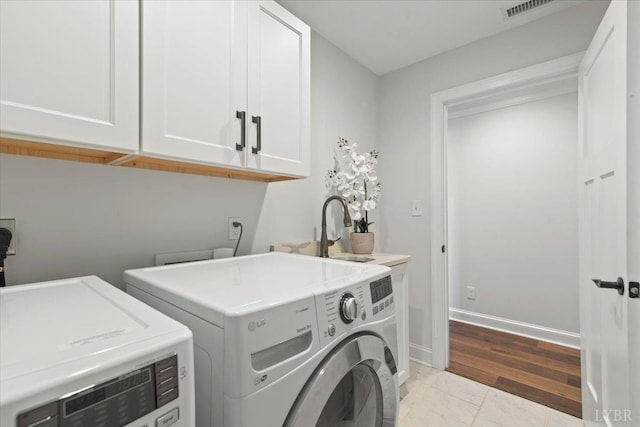 1031 Tori Ct, Forest, VA 24551 - washroom featuring cabinet space, separate washer and dryer, and baseboards