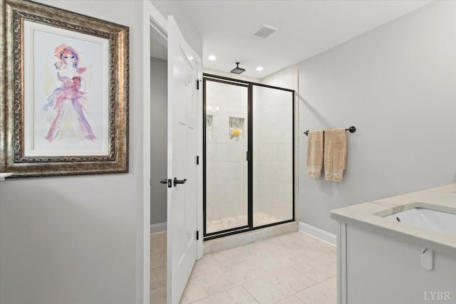 1031 Tori Ct, Forest, VA 24551 - bathroom featuring a shower stall, baseboards, recessed lighting, and double vanity