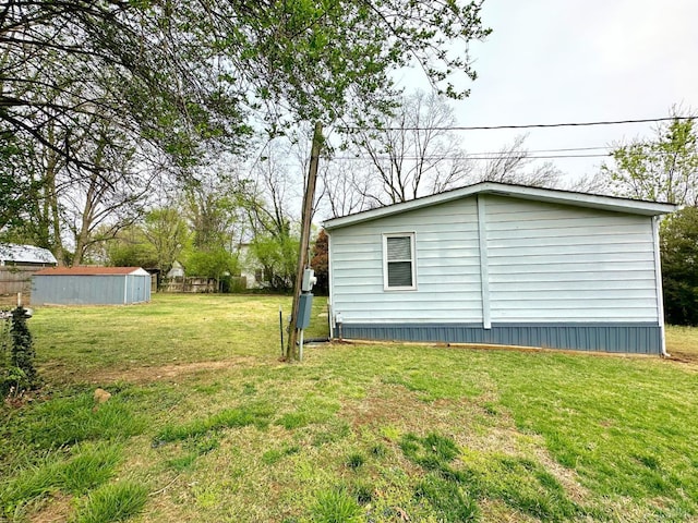 157 Phelps Rd, Madison Heights, VA 24572 - view of green lawn with a shed