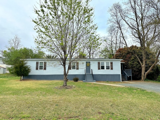 157 Phelps Rd, Madison Heights, VA 24572 - manufactured / mobile home with a front lawn