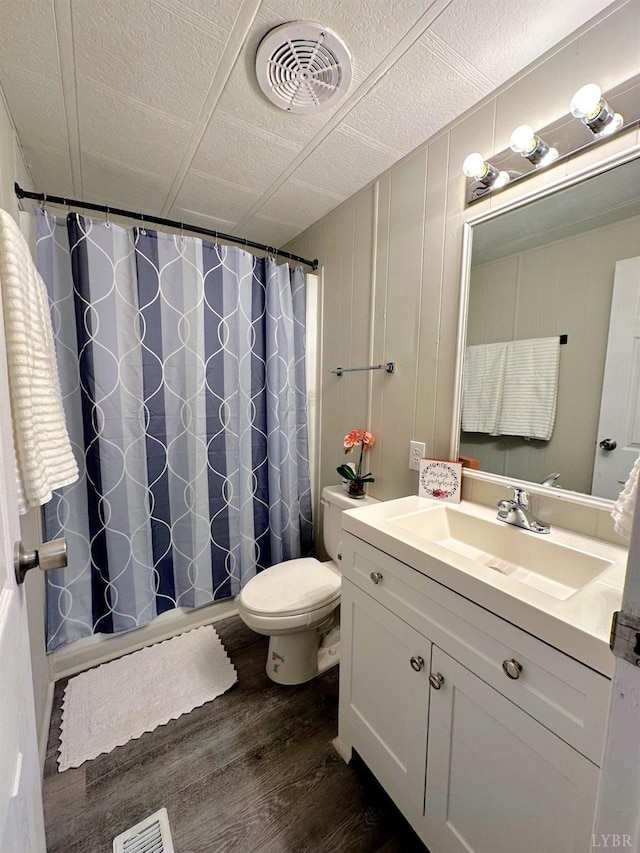 157 Phelps Rd, Madison Heights, VA 24572 - full bath featuring wood finished floors, vanity, and a shower with curtain