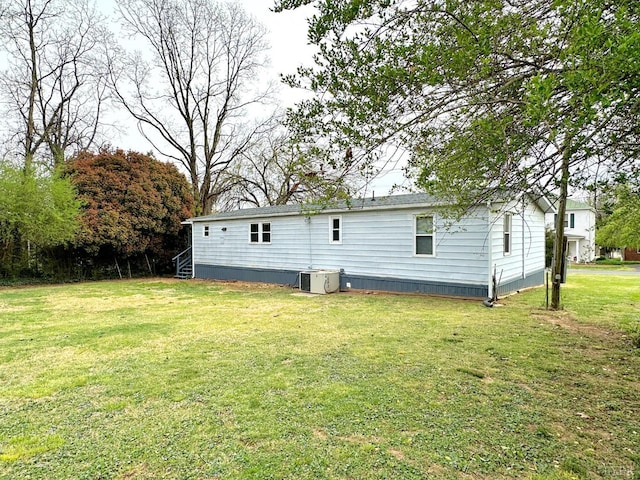 157 Phelps Rd, Madison Heights, VA 24572 - rear view of house featuring a yard