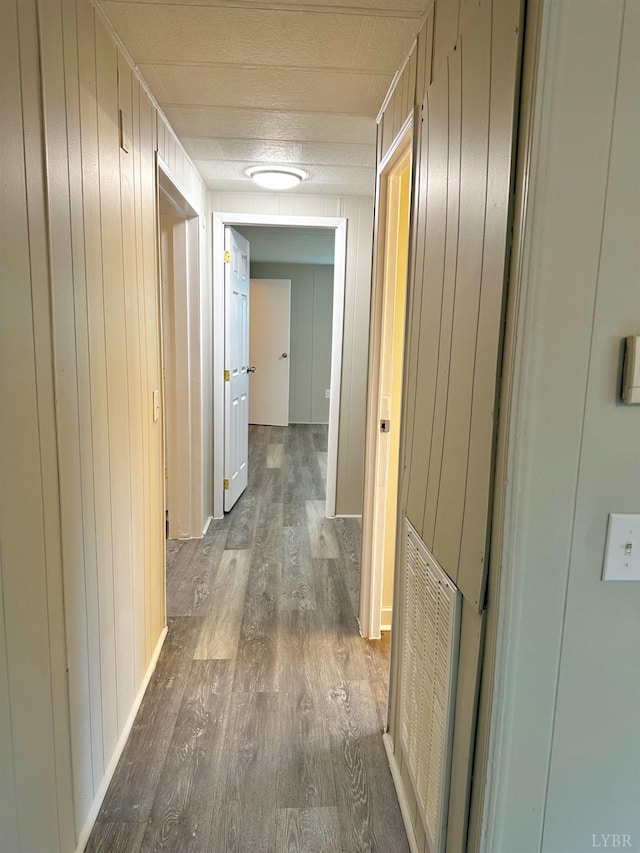 157 Phelps Rd, Madison Heights, VA 24572 - hallway featuring wood finished floors and wood walls