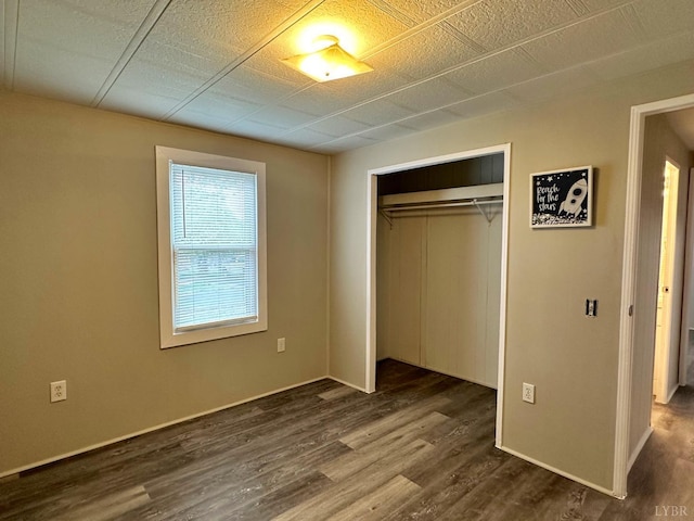 157 Phelps Rd, Madison Heights, VA 24572 - unfurnished bedroom featuring a closet and dark wood-style flooring