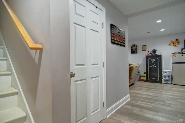 84 Jeter Ct, Lynchburg, VA 24501 - corridor featuring wood finished floors, stairs, baseboards, a paneled ceiling, and recessed lighting