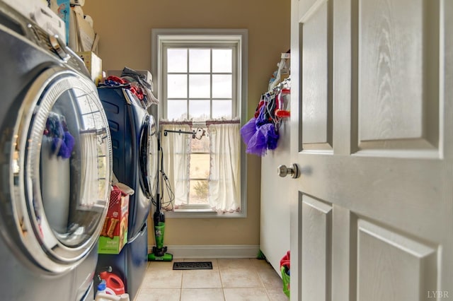 84 Jeter Ct, Lynchburg, VA 24501 - laundry area with washer / dryer, tile patterned flooring, plenty of natural light, and baseboards