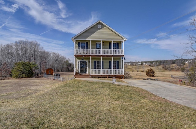 84 Jeter Ct, Lynchburg, VA 24501 - rear view of house featuring a porch, a lawn, and driveway