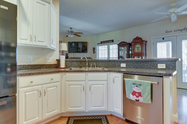 84 Jeter Ct, Lynchburg, VA 24501 - kitchen featuring stainless steel appliances, ceiling fan, a sink, light wood-type flooring, and white cabinets