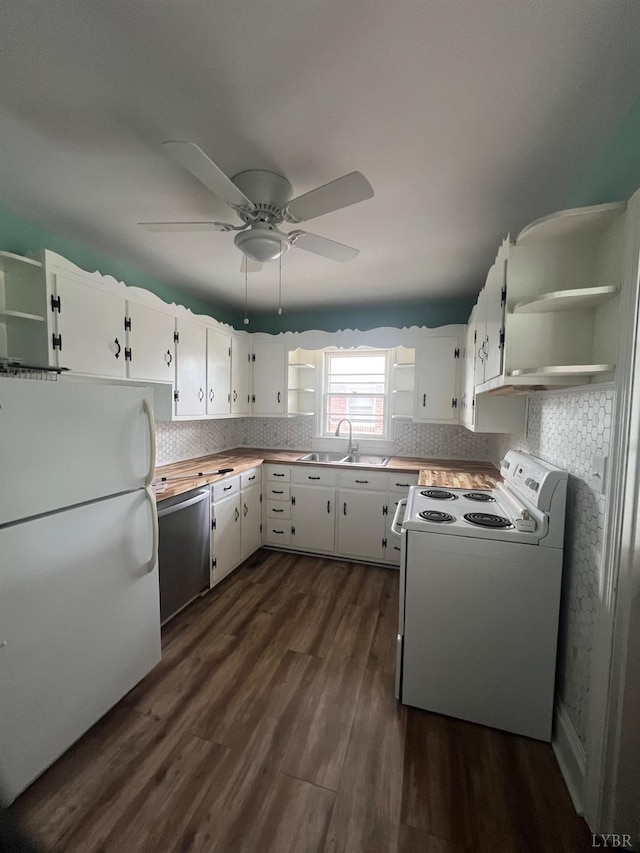 kitchen featuring dark wood-style flooring, tasteful backsplash, open shelves, a sink, and white appliances