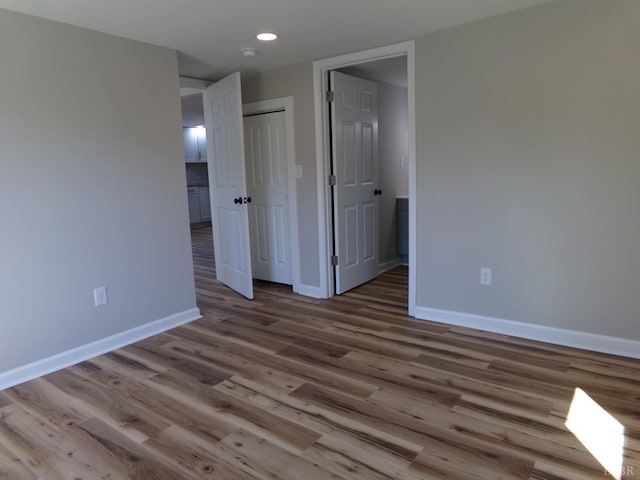1021 Bowman Ln, Bedford, VA 24523 - spare room with baseboards, wood finished floors, and recessed lighting