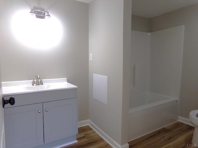 1021 Bowman Ln, Bedford, VA 24523 - full bath with wood finished floors, toilet, vanity, and baseboards