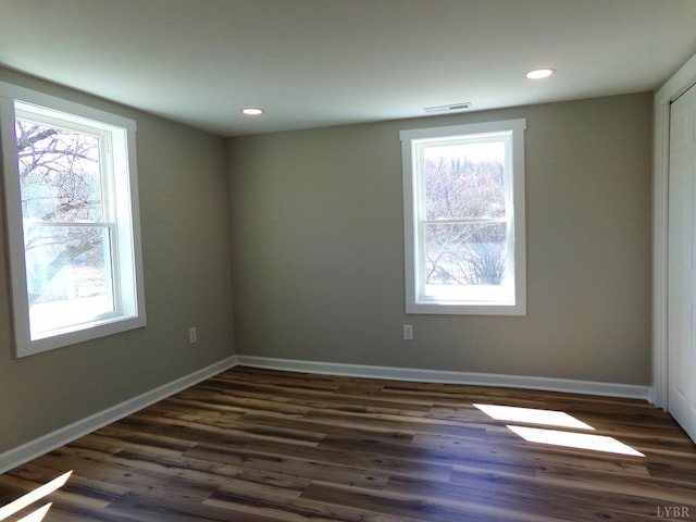 1021 Bowman Ln, Bedford, VA 24523 - spare room featuring plenty of natural light, dark wood-type flooring, baseboards, and recessed lighting