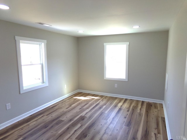 1021 Bowman Ln, Bedford, VA 24523 - spare room featuring plenty of natural light, wood finished floors, baseboards, and recessed lighting