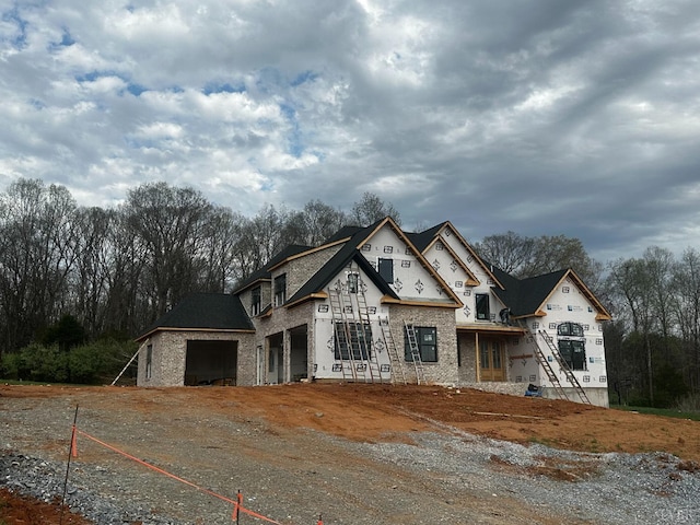 14 Deer Hollow Rd, Forest, VA 24551 - unfinished property with an attached garage and dirt driveway
