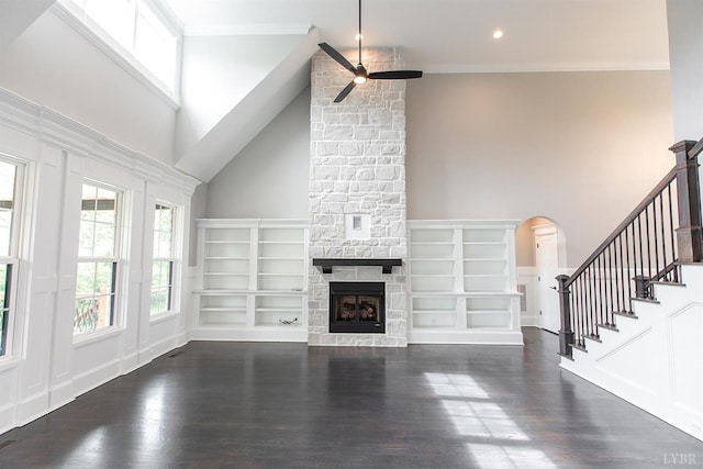 14 Deer Hollow Rd, Forest, VA 24551 - unfurnished living room with a stone fireplace, a ceiling fan, crown molding, stairway, and dark wood-type flooring