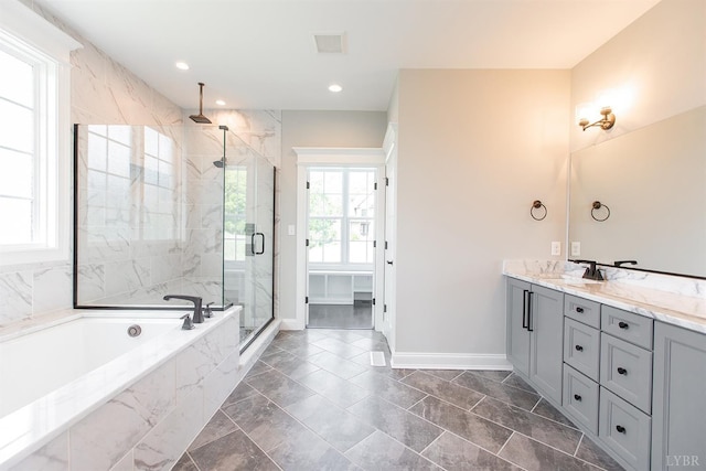 14 Deer Hollow Rd, Forest, VA 24551 - full bathroom featuring vanity, baseboards, a marble finish shower, visible vents, and a garden tub