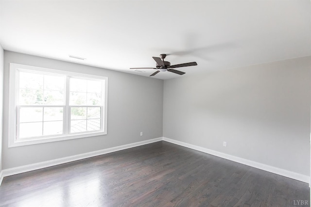 14 Deer Hollow Rd, Forest, VA 24551 - unfurnished room with visible vents, baseboards, ceiling fan, and dark wood-style floors