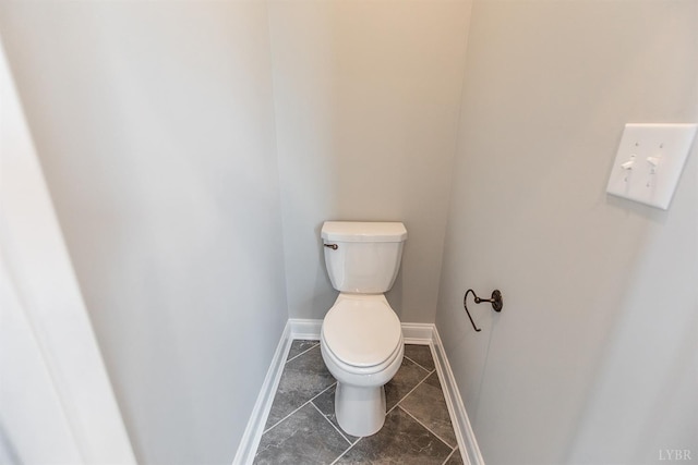 14 Deer Hollow Rd, Forest, VA 24551 - bathroom featuring toilet, baseboards, and tile patterned flooring