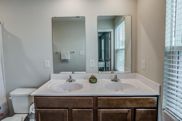 201 Thicket Dr, Lynchburg, VA 24501 - bathroom featuring double vanity and toilet