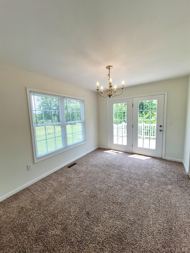 188 Oak Spring Ln, Madison Heights, VA 24572 - carpeted empty room featuring a chandelier and baseboards