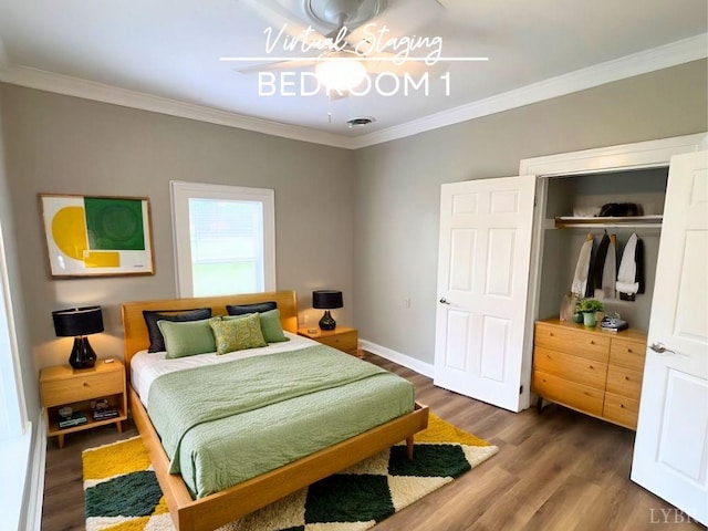 2024 Poplar St, Lynchburg, VA 24504 - bedroom with a closet, a ceiling fan, baseboards, ornamental molding, and wood finished floors