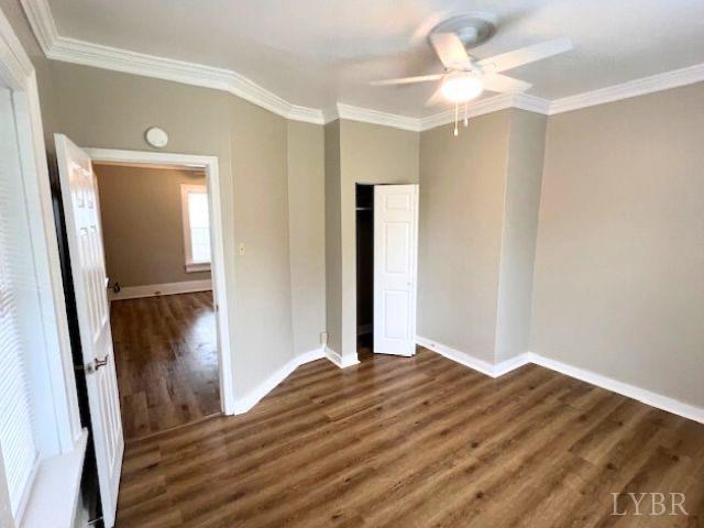 2024 Poplar St, Lynchburg, VA 24504 - spare room featuring baseboards, wood finished floors, a ceiling fan, and crown molding