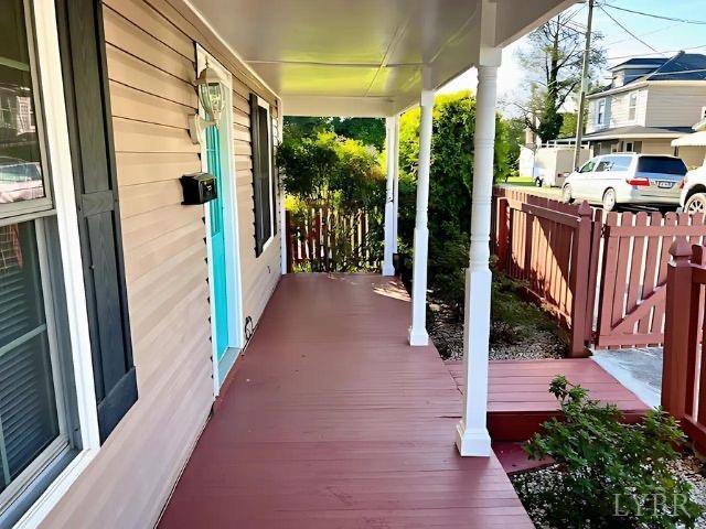 2024 Poplar St, Lynchburg, VA 24504 - wooden terrace featuring covered porch and fence