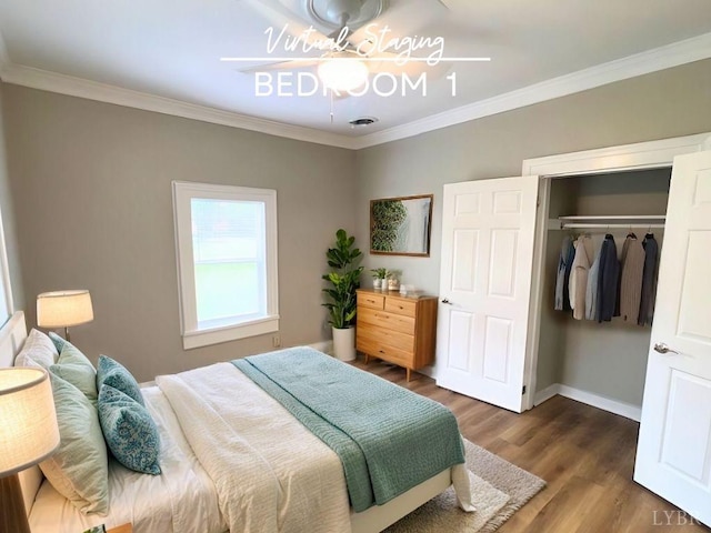 2024 Poplar St, Lynchburg, VA 24504 - bedroom featuring dark wood-type flooring, crown molding, a closet, and ceiling fan