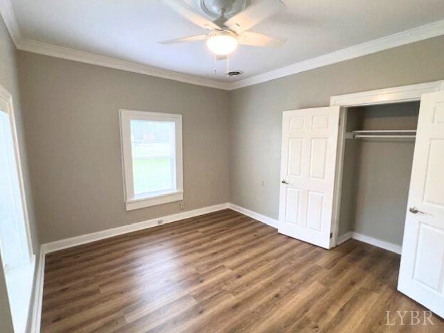 2024 Poplar St, Lynchburg, VA 24504 - unfurnished bedroom featuring crown molding, wood finished floors, a closet, and a ceiling fan