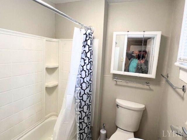 2024 Poplar St, Lynchburg, VA 24504 - full bathroom with shower / bathtub combination with curtain and toilet