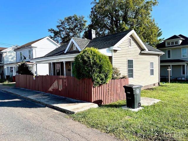 2024 Poplar St, Lynchburg, VA 24504 - view of side of property with a chimney and a yard