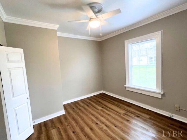 2024 Poplar St, Lynchburg, VA 24504 - unfurnished room with wood finished floors, ceiling fan, and crown molding