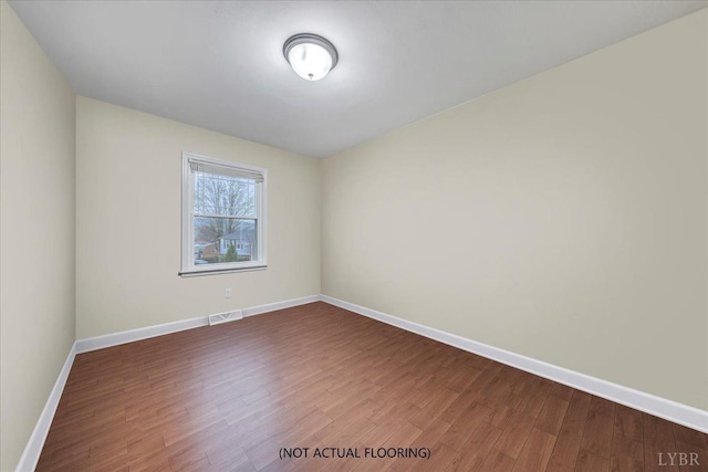 1048 Grove Ln, Roanoke, VA 24012 - unfurnished room with baseboards and wood finished floors