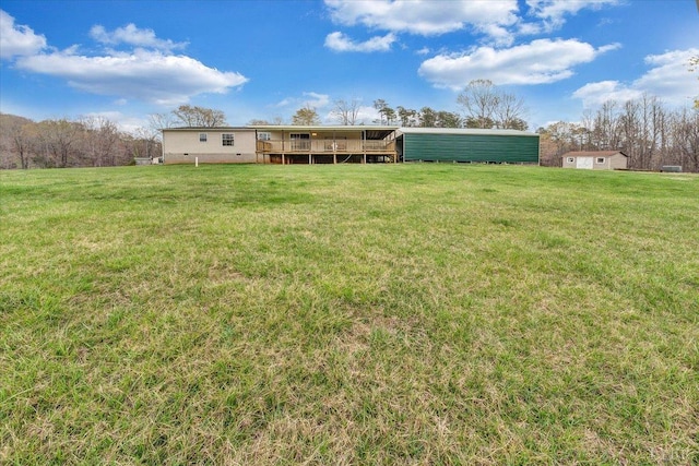 view of yard featuring a deck