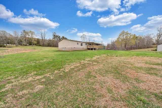 view of yard featuring a deck