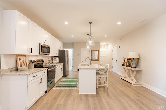 1300 Stoney Ridge Blvd Unit 206, Forest, VA 24551 - kitchen featuring recessed lighting, baseboards, appliances with stainless steel finishes, and a sink