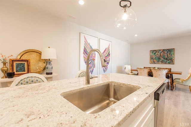 1300 Stoney Ridge Blvd Unit 206, Forest, VA 24551 - kitchen featuring recessed lighting, light stone counters, a sink, dishwasher, and decorative light fixtures